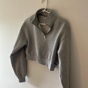 TNA cozy perfect zip crop top